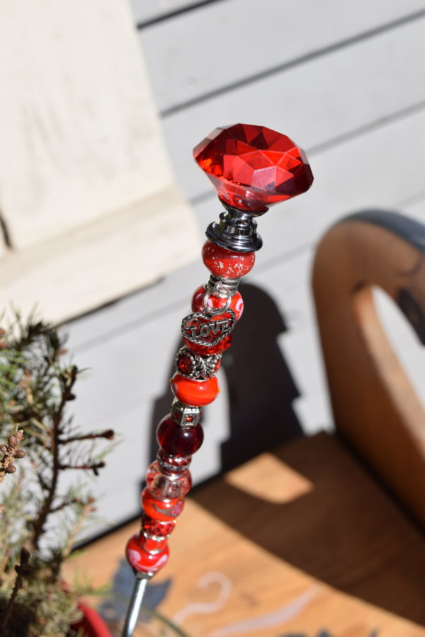 red topped fairy wand with red beads