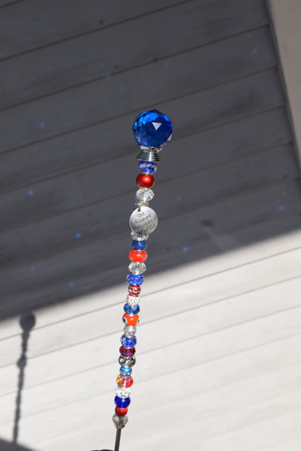 red clear and blue fairy wand with blue crystal top