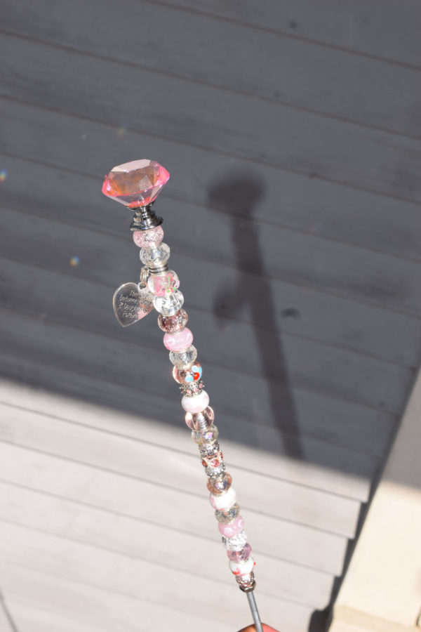 pink beaded wand with mother's love charm